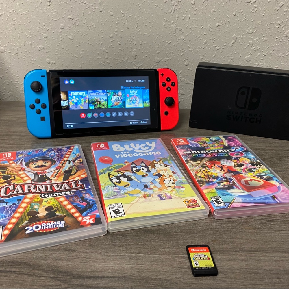Nintendo Switch with Blue and Red Joy-Con and Game Bundle